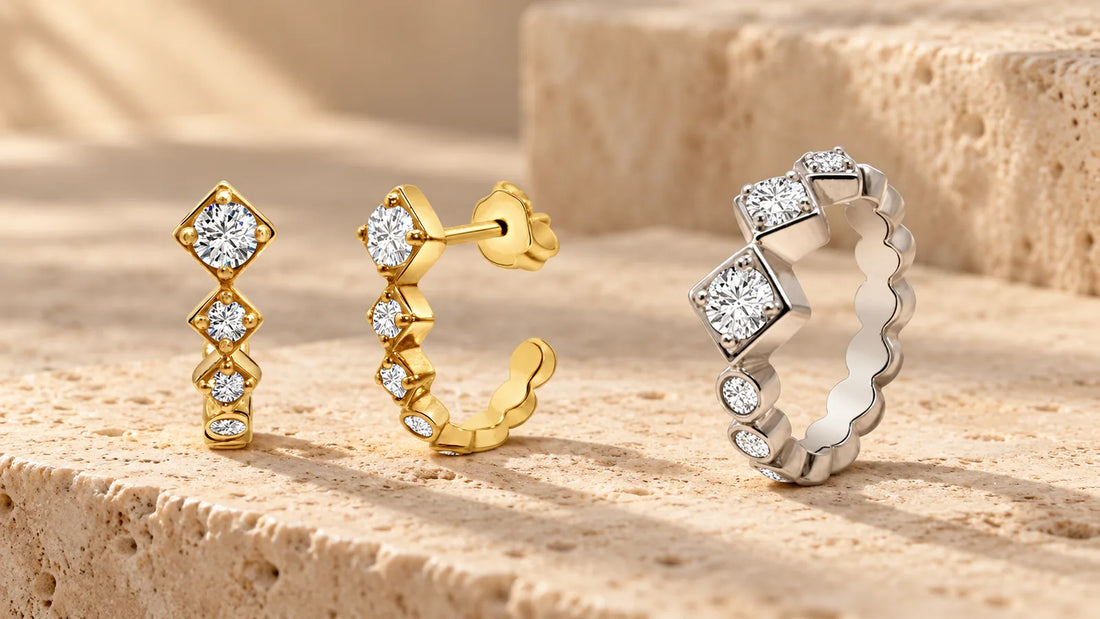 Sparkling Squares Huggies in gold-plated silver and Sparkling Squares Ring in sterling silver on light travertine stone