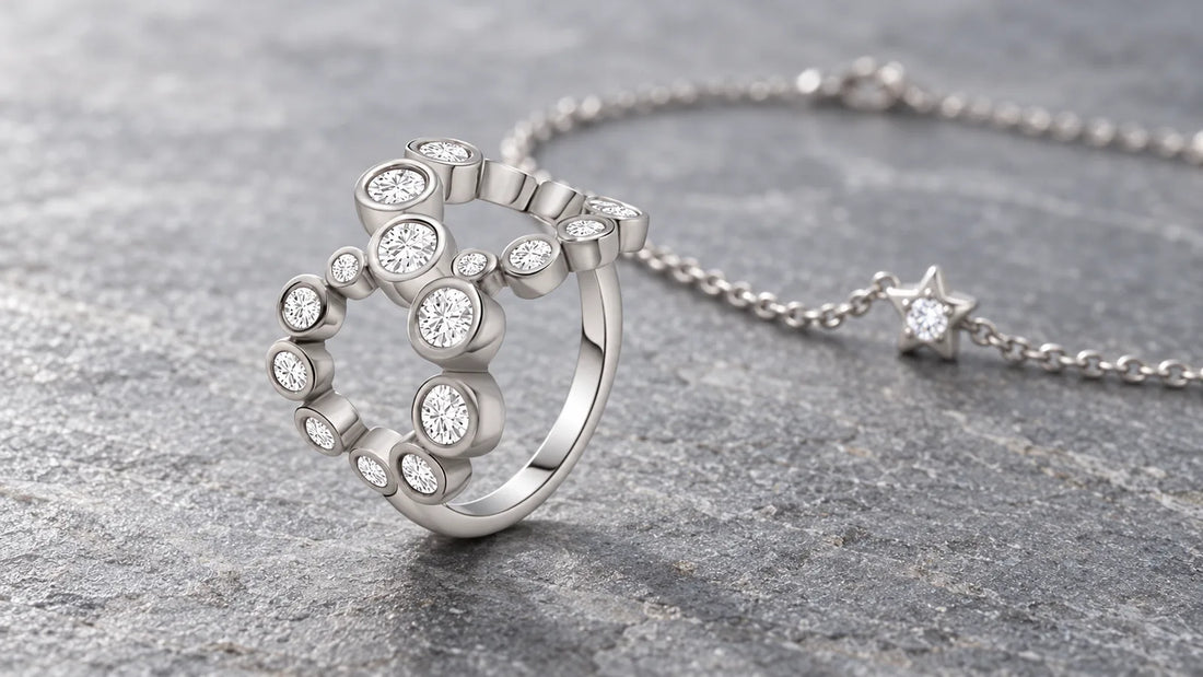Infinity Ring and Star Bracelet in sterling silver on grey slate