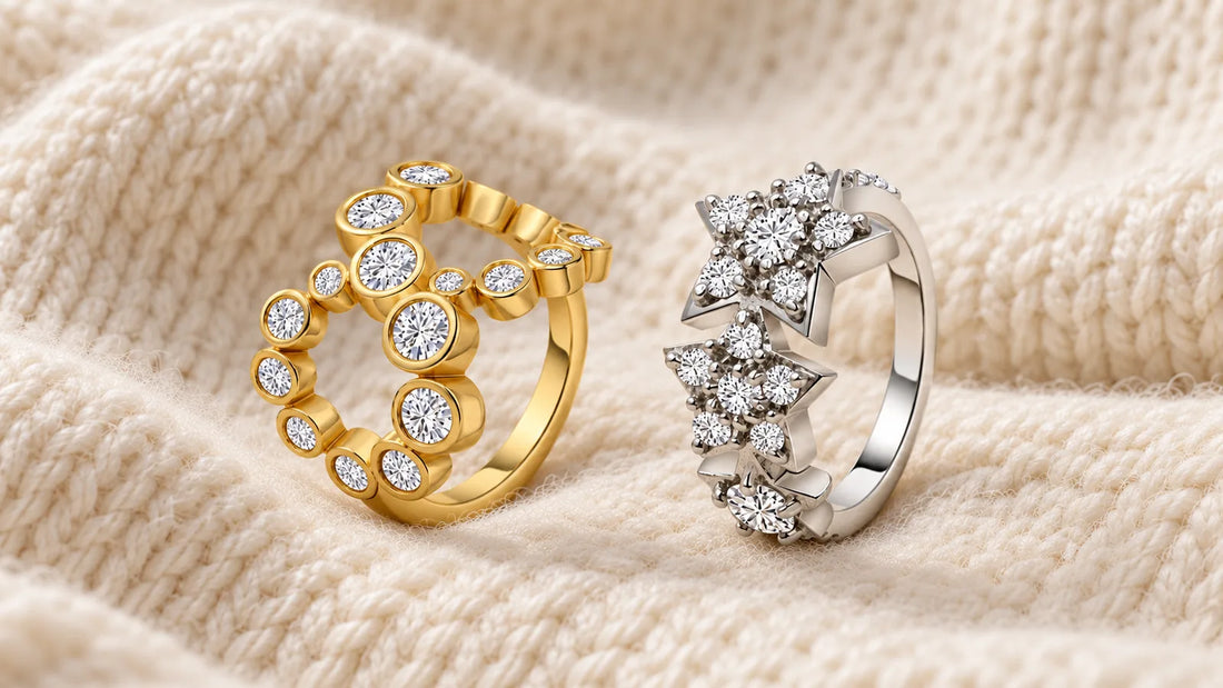 Infinity Ring in gold-plated silver and Multi Stars Ring in sterling silver on a cream knit sweater